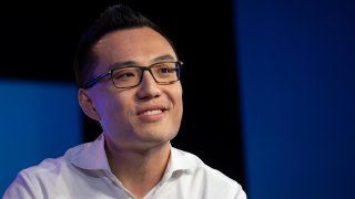 Tony Xu, co-founder and CEO of DoorDash Inc., smiles during the Wall Street Journal Tech Live conference in Laguna Beach, California, Oct. 22, 2019.