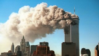 Smoke pours from the Twin Towers of the World Trade Center after they were hit by two hijacked airliners in a terrorist attack in New York City, Sept. 11, 2001.