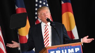 Republican presidential nominee Donald Trump takes the stage during a rally at Norris Penrose Equestrian Center in Colorado Springs, October 18, 2016.