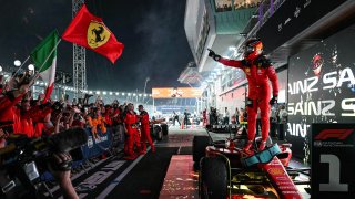 Ferrari’s Spanish driver Carlos Sainz Jr celebrates winning the Singapore Formula One Grand Prix night race at the Marina Bay Street Circuit in Singapore on Sept. 17, 2023.