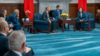 In this photo released by the Taiwan Presidential Office, Taiwan’s President Tsai Ing-wen meets with Australian lawmaker Josh Wilson, third right and other lawmakers at the Presidential Office in Taipei, Taiwan, Tuesday, Sept. 26, 2023.