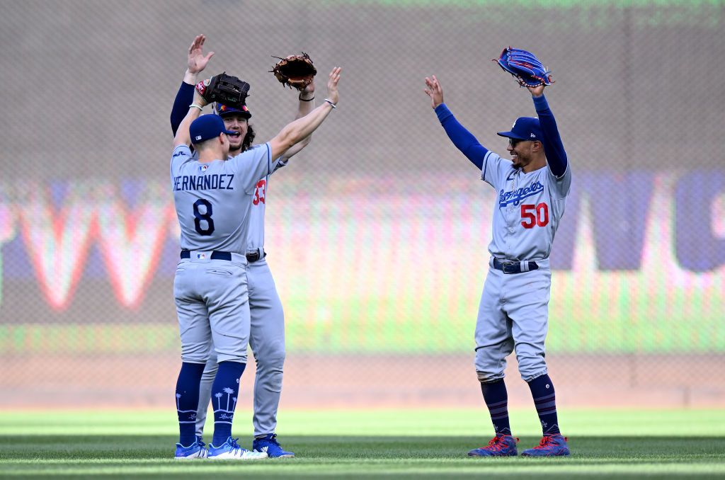 Dodgers outlast rain, defeat Nationals 7-3 to extend NL West lead to 13  games - The San Diego Union-Tribune