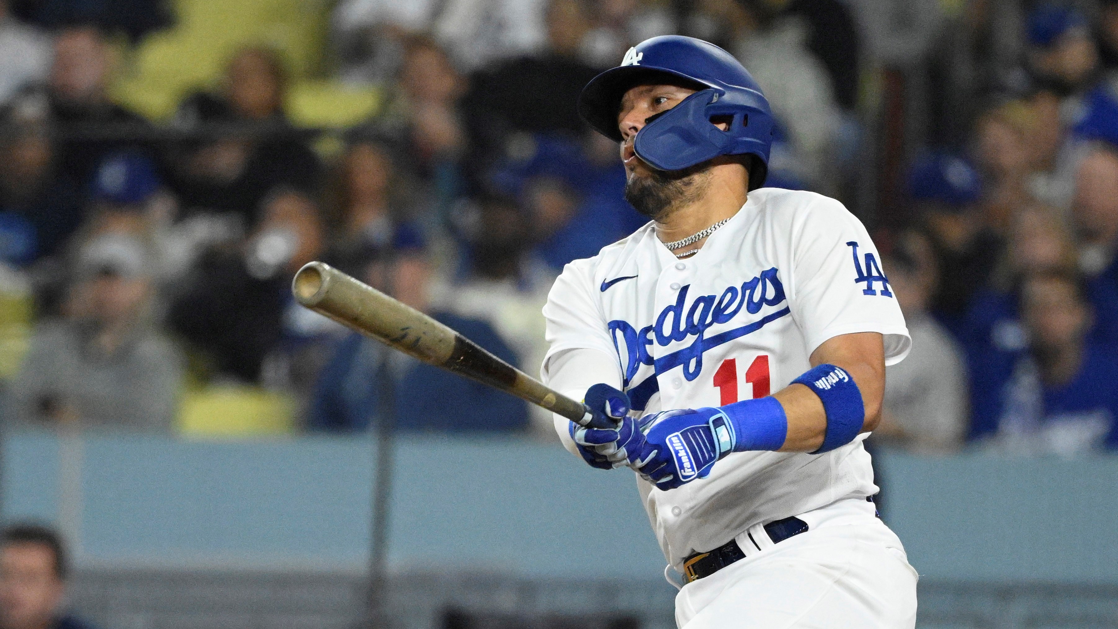 Los Angeles Dodgers' Miguel Rojas (11) celebrates on second base