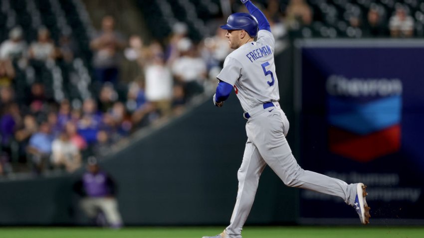 Freddie Freeman reaches 100 RBIs and Dodgers beat Rockies 8-2 to