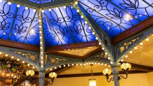 Guests will find a blue skylight inside Tiana’s Palace, which will open in New Orleans Square at Disneyland Park in Anaheim, Calif., on Sept. 7, 2023. Inspired by the Walt Disney Animation Studios film “The Princess and the Frog,” the reimagined quick service restaurant will serve authentic New Orleans flavors inspired by Tiana’s friends and adventures. While Tiana’s Palace is not a character dining location, guests may find Tiana in New Orleans Square. (Christian Thompson/Disneyland Resort)