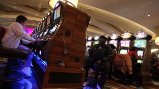 People gamble at a casino in Detroit, Michigan.