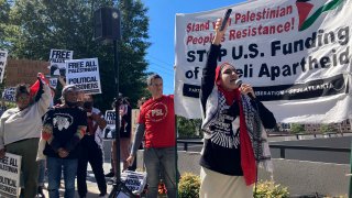 Pro-Palestinian demonstrators chant slogans outside the Israeli consulate in Atlanta on Sunday, Oct. 8, 2023. Supporters of Israel and backers of the Palestinian cause rallied in many American cities Sunday over the conflict that has killed hundreds and wounded thousands in the Middle East.