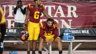 Southern California quarterback Caleb Williams, right, reacts with running back Austin Jones after the team's loss to Utah in an NCAA college football game, Saturday, Oct. 21, 2023, in Los Angeles.