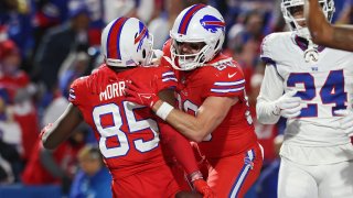 ORCHARD PARK, NEW YORK – OCTOBER 15: Dawson Knox #88 of the Buffalo Bills celebrates with Quintin Morris #85 of the Buffalo Bills after Morris caught a touchdown in the fourth quarter of a game against the New York Giants at Highmark Stadium on October 15, 2023 in Orchard Park, New York. (Photo by Bryan M. Bennett/Getty Images)