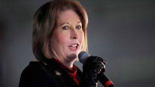 Attorney Sidney Powell, an attorney for Donald Trump, speaks during in Alpharetta, Ga., Dec. 2, 2020.