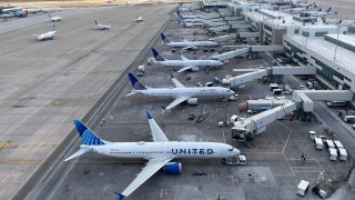 United Airlines planes at Denver International Airport.