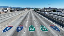 Los Angeles, CA, Sunday, November 12, 2023 - Aerial views of the 10 Freeway a day after a large pallet fire burned below, shutting the freeway to traffic. (Robert Gauthier/Los Angeles Times via Getty Images)