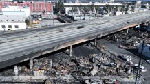 Los Angeles, CA, Sunday, November 12, 2023 - Aerial views of the 10 Freeway a day after a large pallet fire burned below, shutting the freeway to traffic. (Robert Gauthier/Los Angeles Times via Getty Images)Los Angeles, CA, Sunday, November 12, 2023 - Aerial views of the 10 Freeway a day after a large pallet fire burned below, shutting the freeway to traffic. (Robert Gauthier/Los Angeles Times via Getty Images)