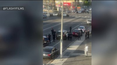 LAPD officer shoots man armed with hammer