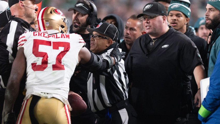 Dec 3, 2023; Philadelphia, Pennsylvania, USA; San Francisco 49ers linebacker Dre Greenlaw (57) has an altercation with Philadelphia Eagles staff member Dom DiSandro during the third quarter at Lincoln Financial Field. Mandatory Credit: Bill Streicher-USA TODAY Sports