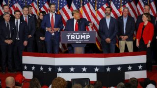 Republican presidential candidate and former U.S. President Donald Trump takes the stage during his Iowa caucus night watch party in Des Moines, Iowa, U.S., January 15, 2024. 