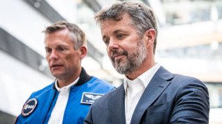 Danish engineer and ESA astronaut Andreas Mogensen (L) and Denmark's Crown Prince Frederik