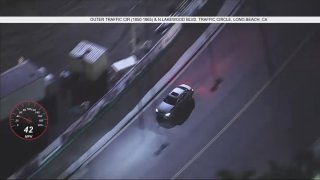The California Highway Patrol chase a vehicle in Long Beach on Friday, Jan. 12, 2024.