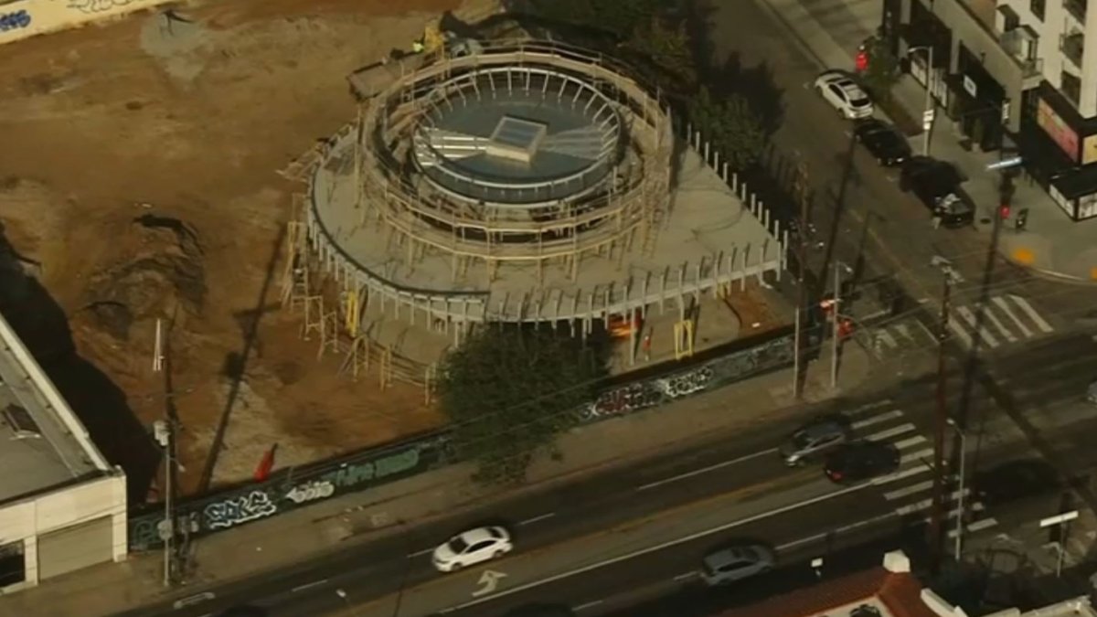 Tesla building Hollywood charging station with restaurant, movies NBC