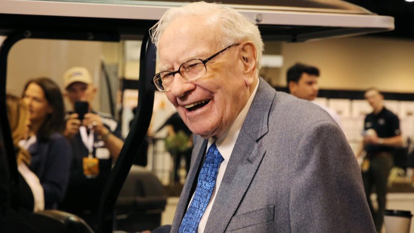 Warren Buffett tours the grounds at the Berkshire Hathaway Annual Shareholders Meeting in Omaha Nebraska.