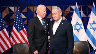 US President Joe Biden (L) and Prime Minister Benjamin Netanyahu (R) meet in Tel Aviv, Israel on October 18, 2023. (Photo by GPO/ Handout/Anadolu via Getty Images)