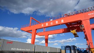 A China-Europe freight train returning from Russia arrives at a railway container freight center on September 20, 2023 in Manzhouli, China.