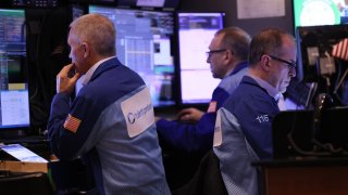 Traders work on the floor of the New York Stock Exchange during afternoon trading on February 05, 2024 in New York City. 