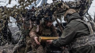 File. Ukrainian soldiers prepare L119 artillery in the direction of Bakhmut, as Russia-Ukraine war continues in Donetsk Oblast, Ukraine on February 13, 2024. 