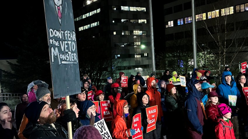 People rally outside the Alaska Capitol