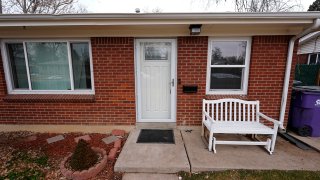 FILE – The residence where a former funeral home owner kept a deceased women’s body in a hearse for two years as well as the remains of 30 cremated people is shown Friday, Feb. 16, 2024, in southwest Denver.