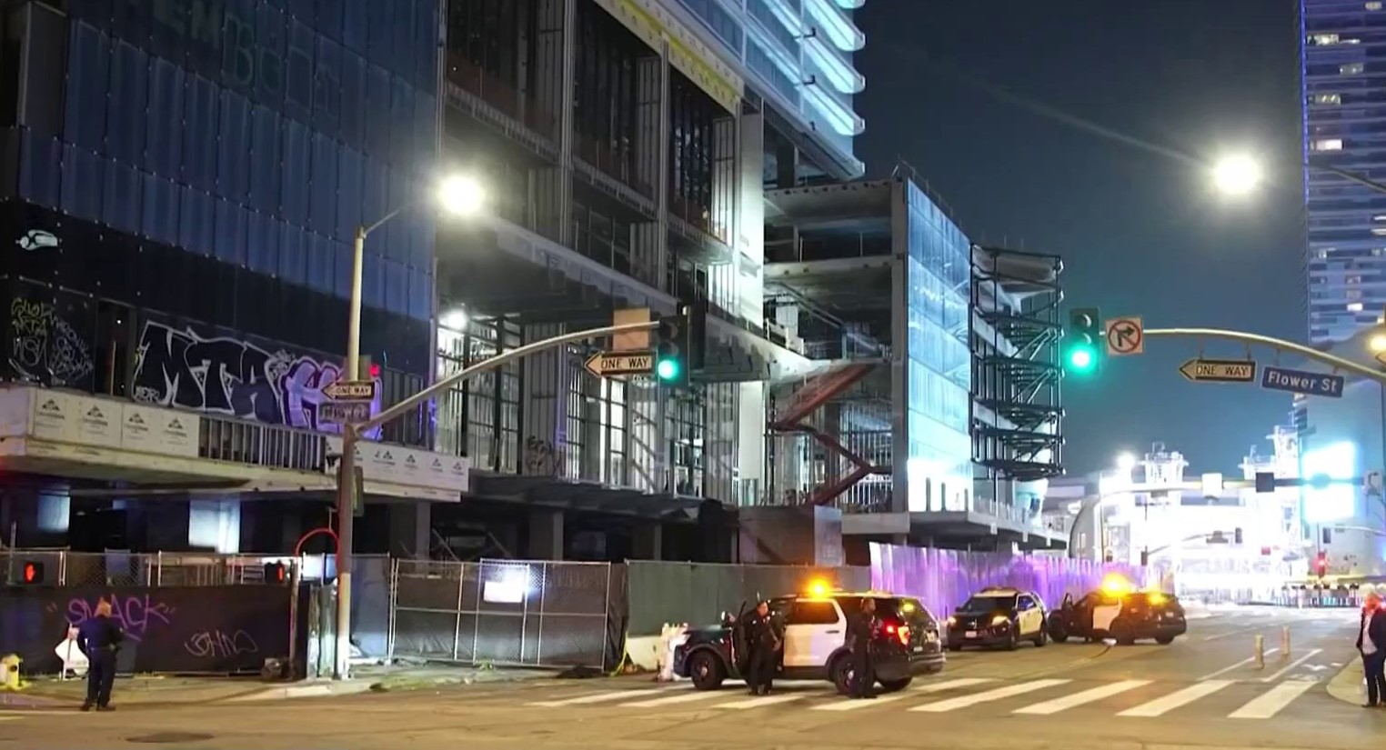 LAPD officers surround unfinished downtown LA high-rise – NBC Los