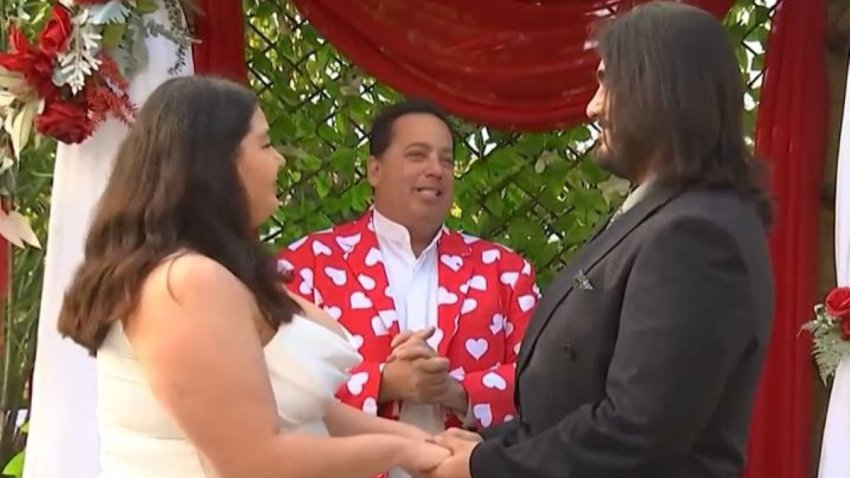 A couple weds at the Cute Little Wedding Chapel in Long Beach Feb. 14, 2024.