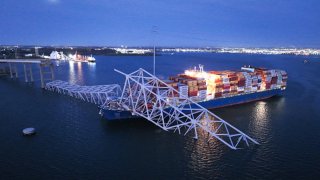 An aerial view of the collapsed Francis Scott Key Bridge after a collision with a cargo ship in Baltimore, Maryland, United States on March 26, 2024.