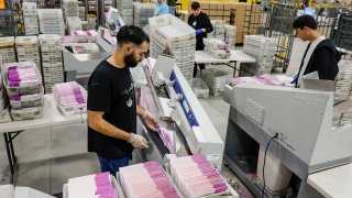 Industry, CA, Thursday, March 7, 2024 – LA County workers continue to process ballots cast in this year’s primary election at the LA County Ballot Processing Center. (Robert Gauthier/Los Angeles Times via Getty Images)