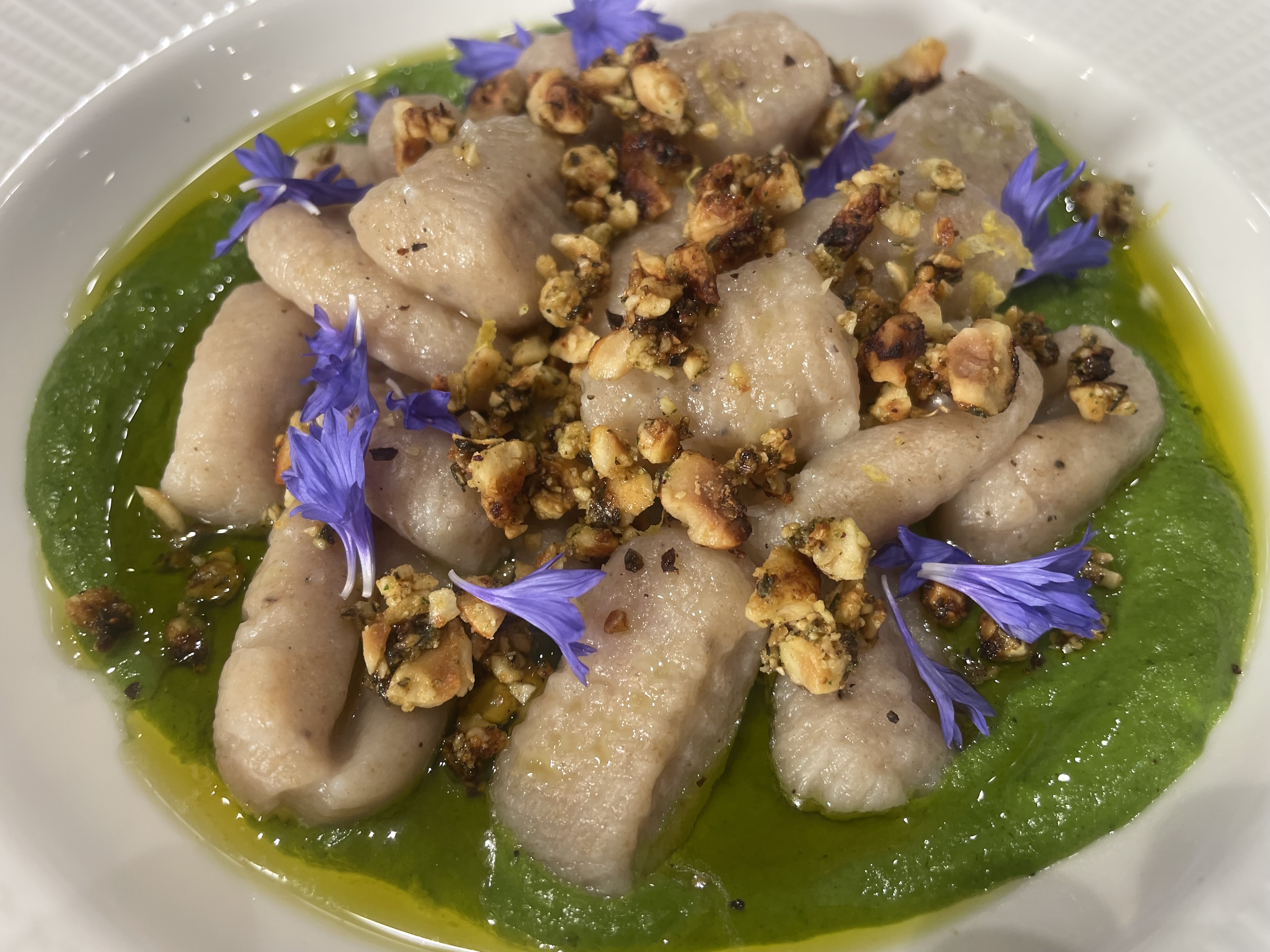 Learn how to use stinging nettles in your cooking with this delicious hazelnut pesto gnocchi