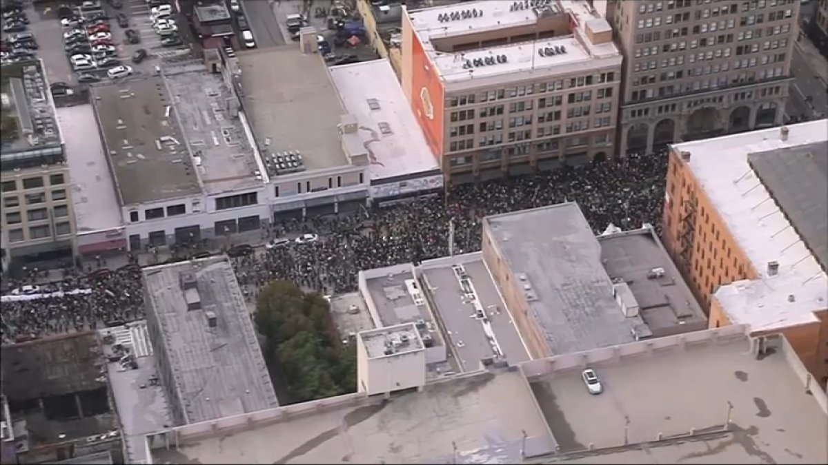 Thousands of pro-Palestine protesters block downtown LA streets to call for ceasefire