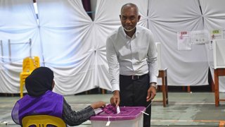 Maldives’ President Mohamed Muizzu casts his ballot during the country’s parliamentary election, in Male on April 21, 2024. The Maldives votes in a parliamentary election likely to test Muizzu’s tilt towards China and away from India, the luxury tourism hotspot’s traditional benefactor.