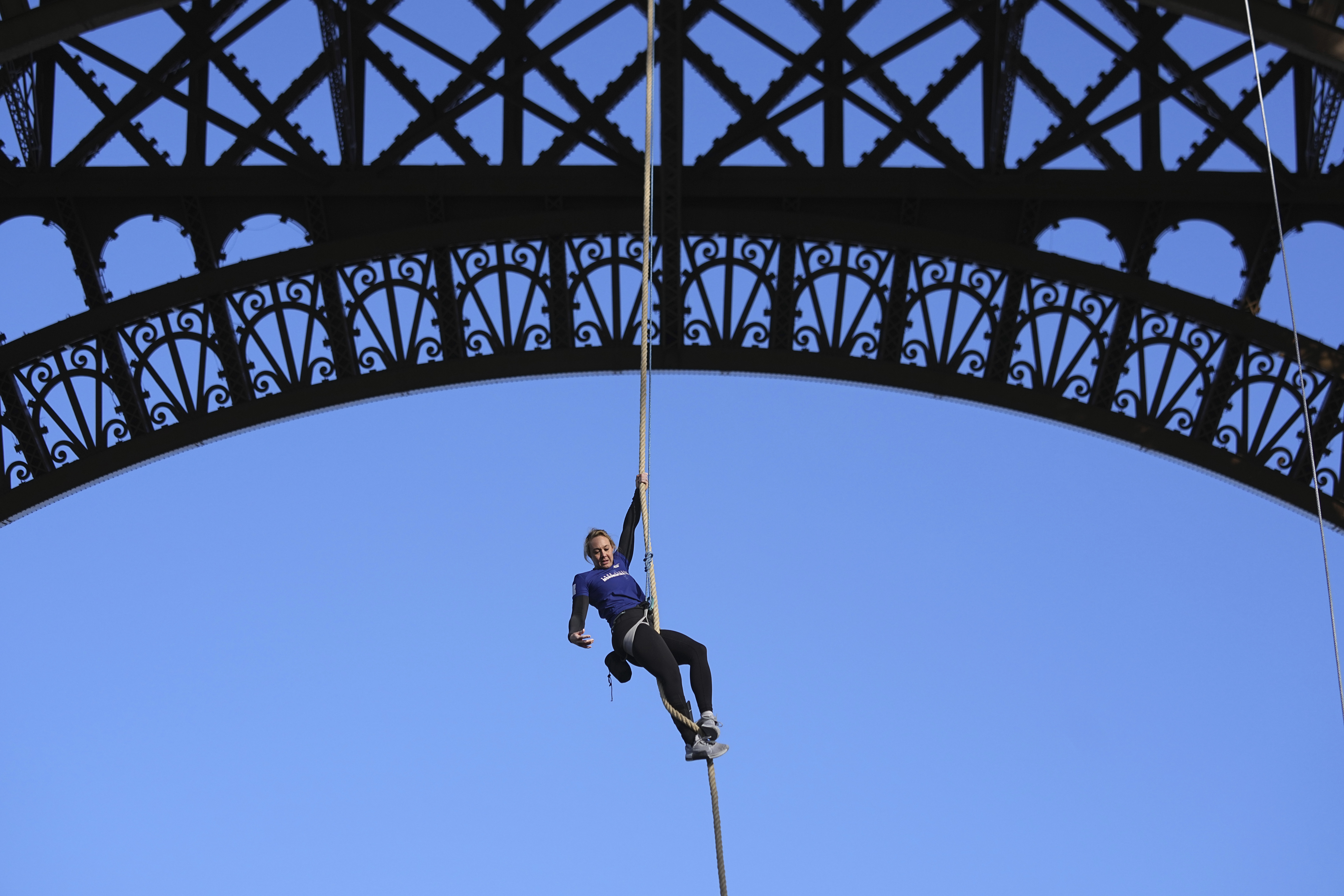 French woman climbs rope up Eiffel Tower for new world record – NBC Los ...