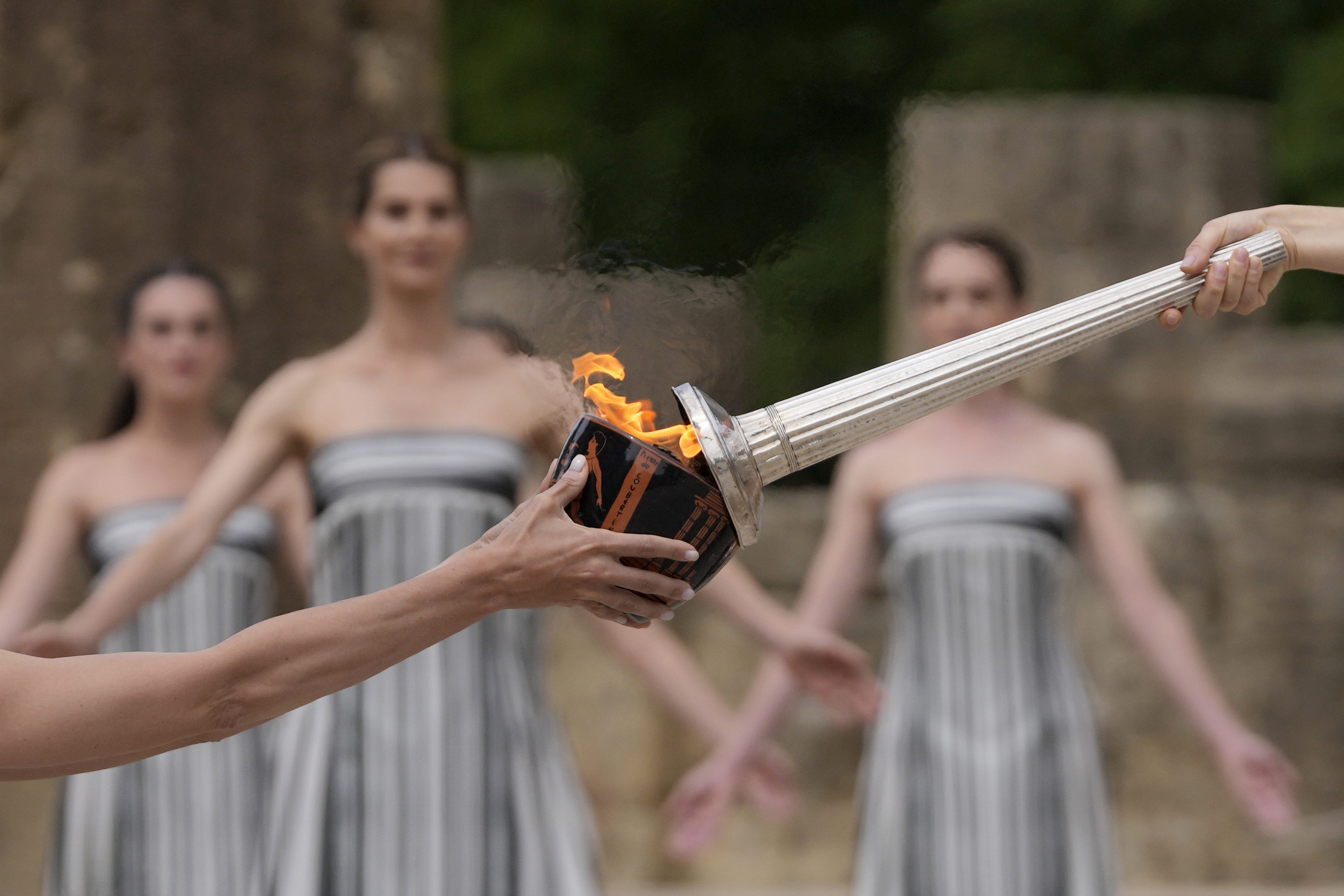 Despite weather glitch, the Paris Olympics flame is lit at the Greek
cradle of ancient games