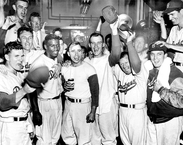 Dodgers celebrate in the clubhouse after defeating the Phila