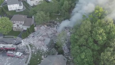 NJ house explosion leaves 1 dead, another critically injured