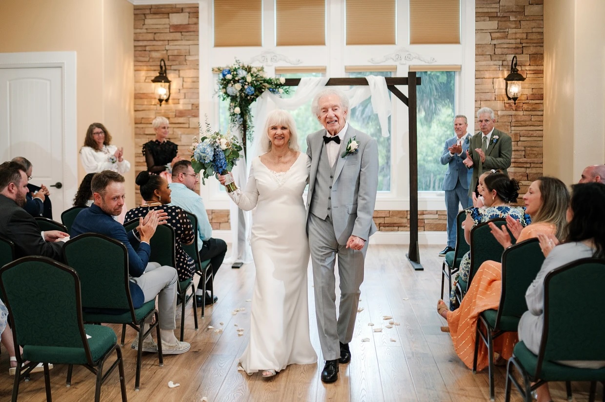 Bride, 88, finally gets to wear wedding dress, veil as she marries her
first crush