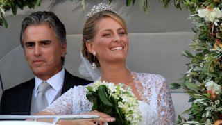 Tatiana Blatnik and step-father Atilio Brillembourg arrive at the Cathedral of Ayios Nikolaos (St. Nicholas) for her wedding to Prince Nikolaos of Greece on August 25, 2010 in Spetses, Greece.