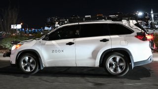 A Toyota sport-utility vehicle modified by Zoox, a subsidiary of Amazon.com, which combines radars, lidar, and cameras to test its software, drives on a road ahead of the Consumer Electronics Show (CES) of Las Vegas, Nevada on January 3, 2023.