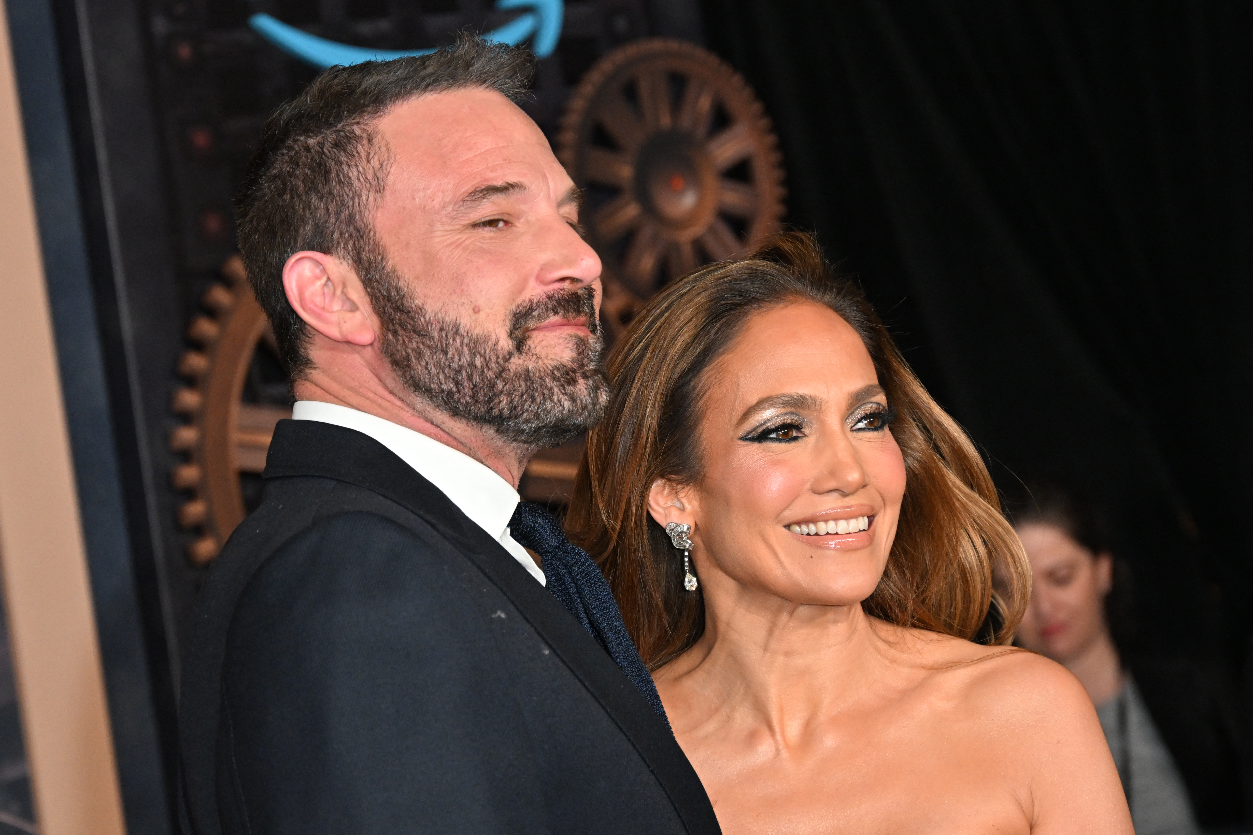 Ben Affleck and Jennifer Lopez step out with wedding rings amid
breakup rumors