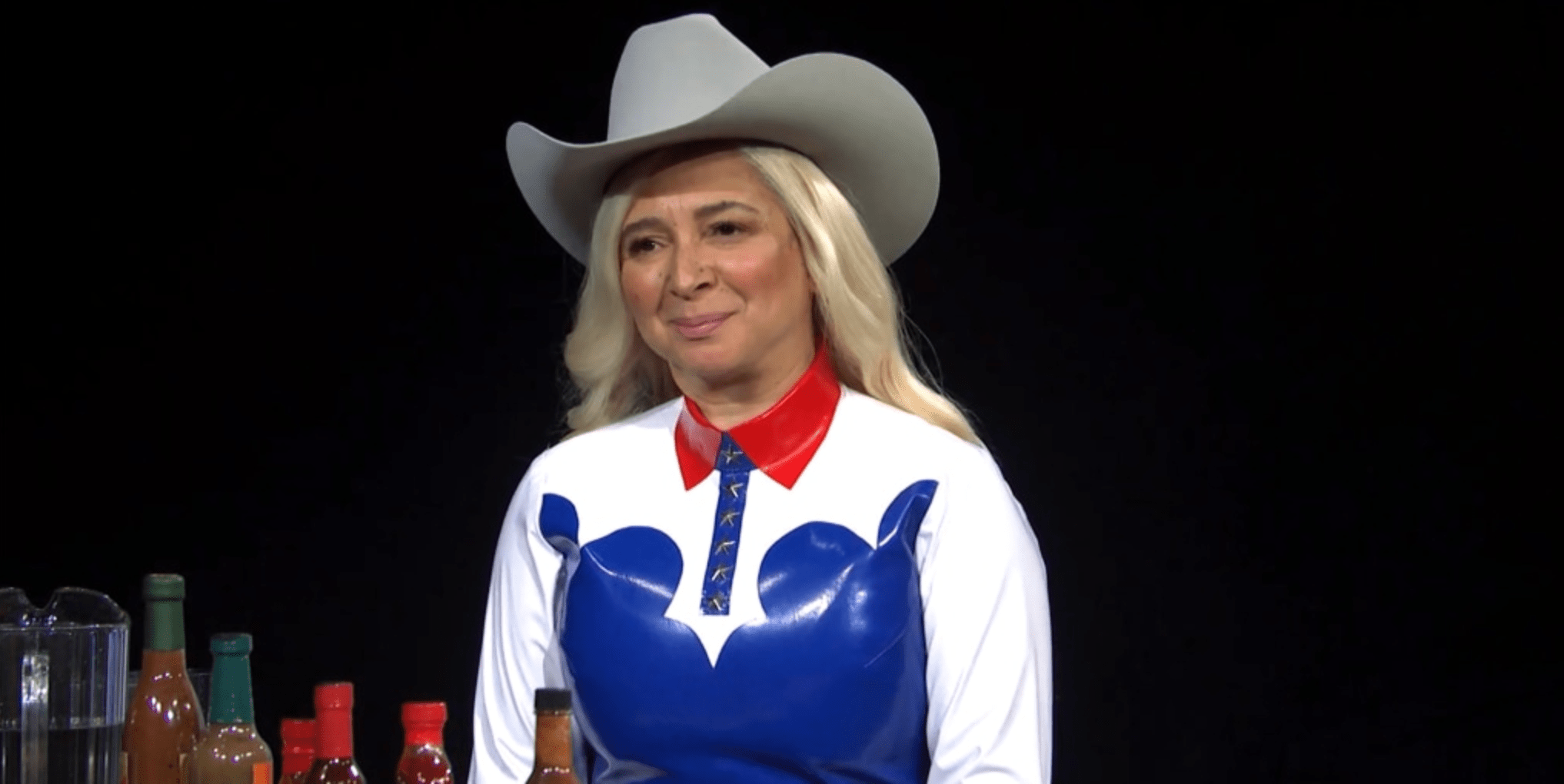 Maya Rudolph channels a ‘Cowboy Carter'-inspired Beyoncé on ‘SNL'
in ‘Hot Ones' sketch