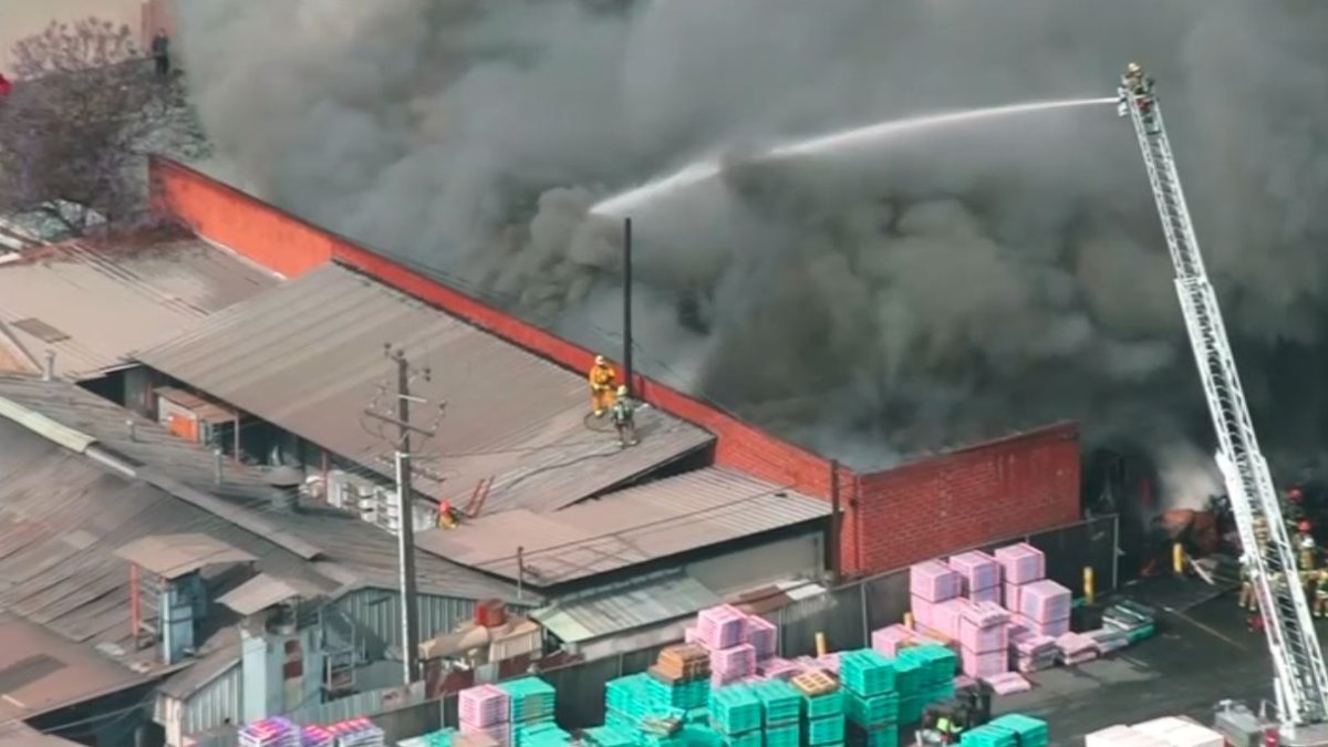 A fire at a large commercial building Wednesday morning sent thick smoke over the Lynwood area.