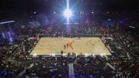 How many WNBA teams play at NBA arenas? Looking at the home venue for each franchise