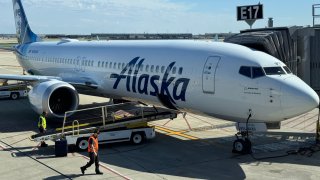 An Alaska Airlines Boeing 737-9 MAX sits at gate at O’Hare International Airport in Chicago, Illinois on May 22, 2024.