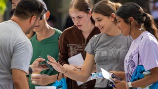 Samantha McCloud, 16, left, Victoria Garcia, 16, Jessel Rincon, 16, at college and career fair at Temple City High School on Saturday, Oct. 21, 2023 in Temple City, CA.